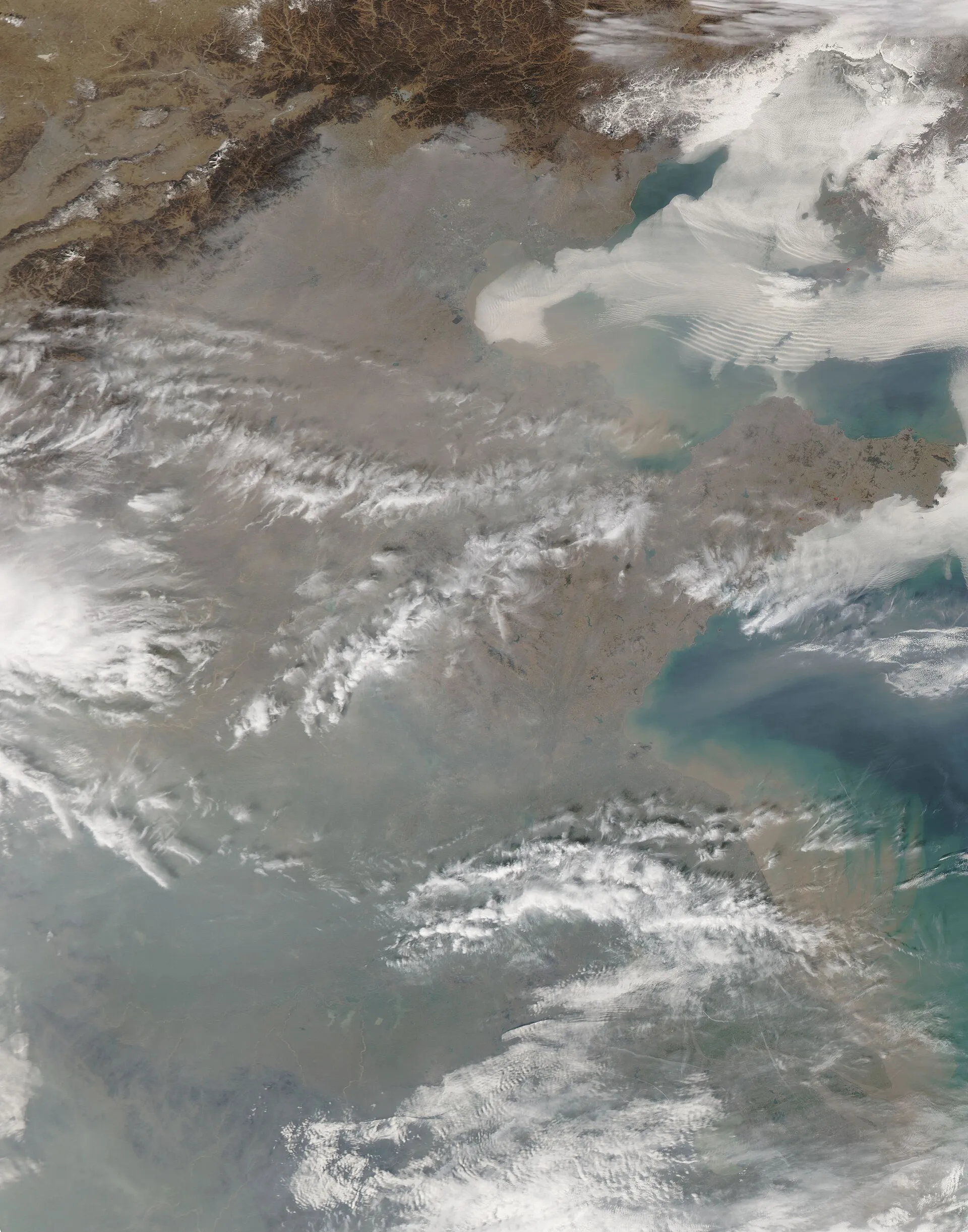 Image satellitaire du 5 mars 2006 montrant un voile de pollution sur Pékin et sa région.